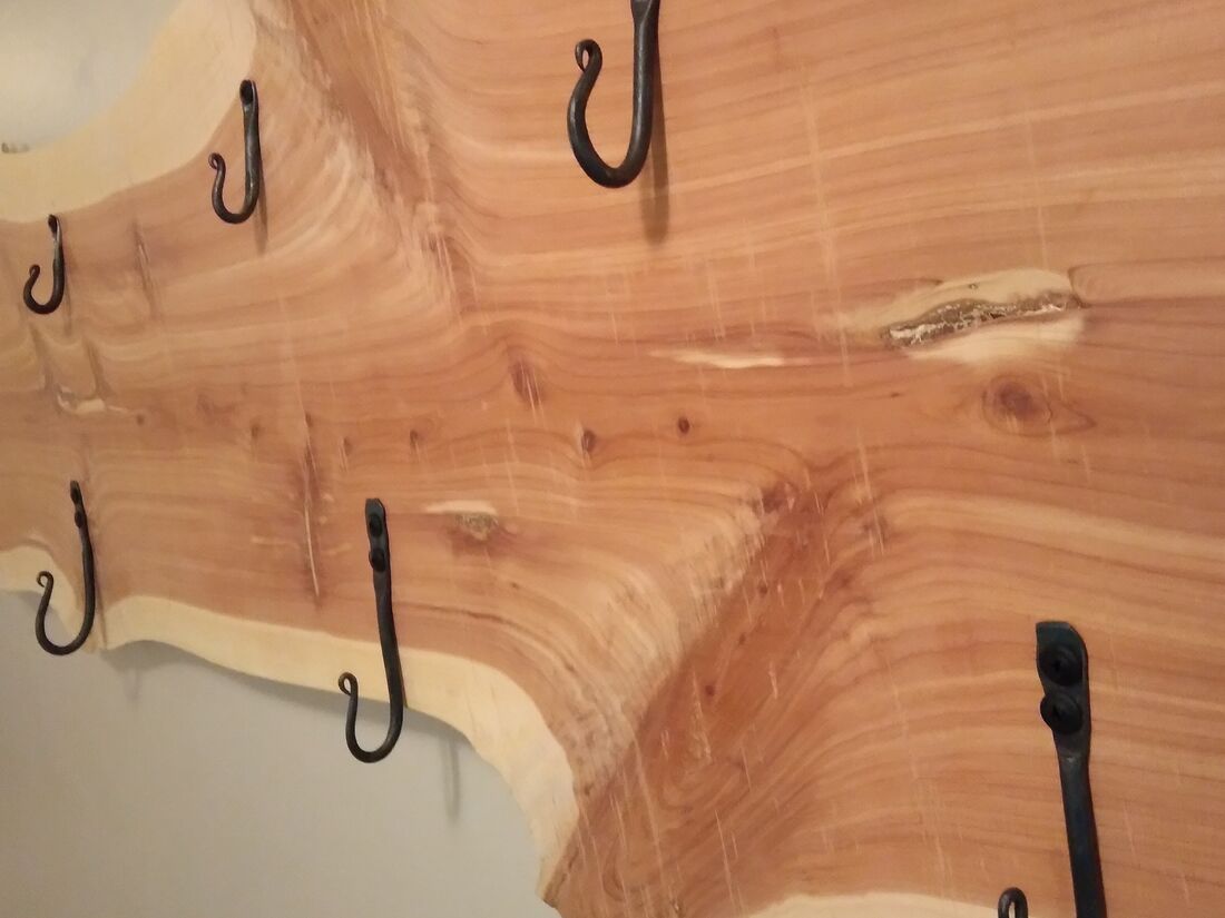 Detail of the cedar coat rack